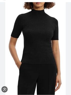 Like new. Black ribbed mock neck 3/4 sleeve by Kotn.